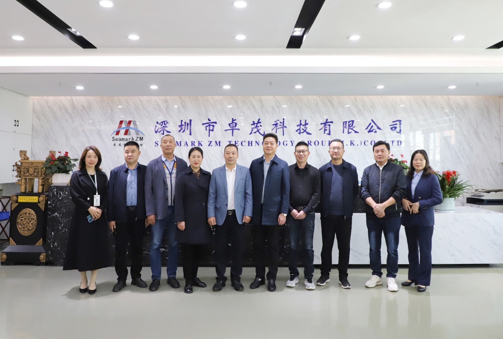 聞總與湖北省?？悼h政府副縣長龔夫一行合影.jpg